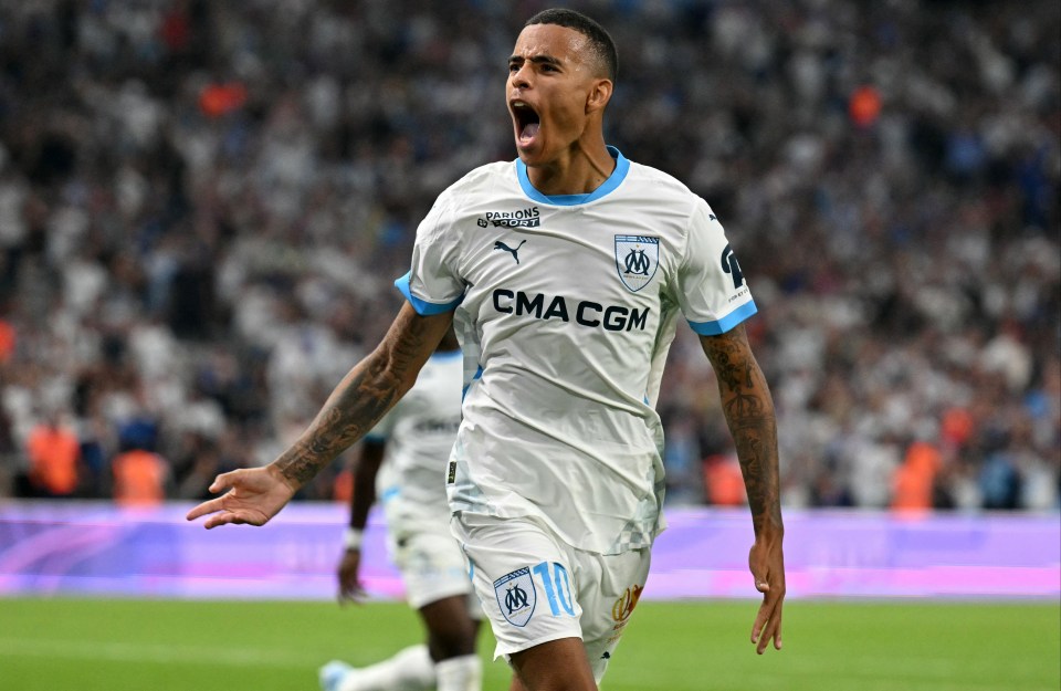 a soccer player wearing a shirt that says cma cgm