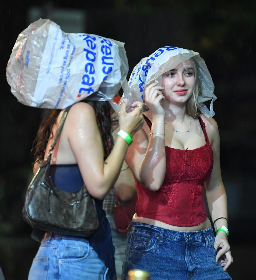 a woman with a plastic bag on her head that says repeat