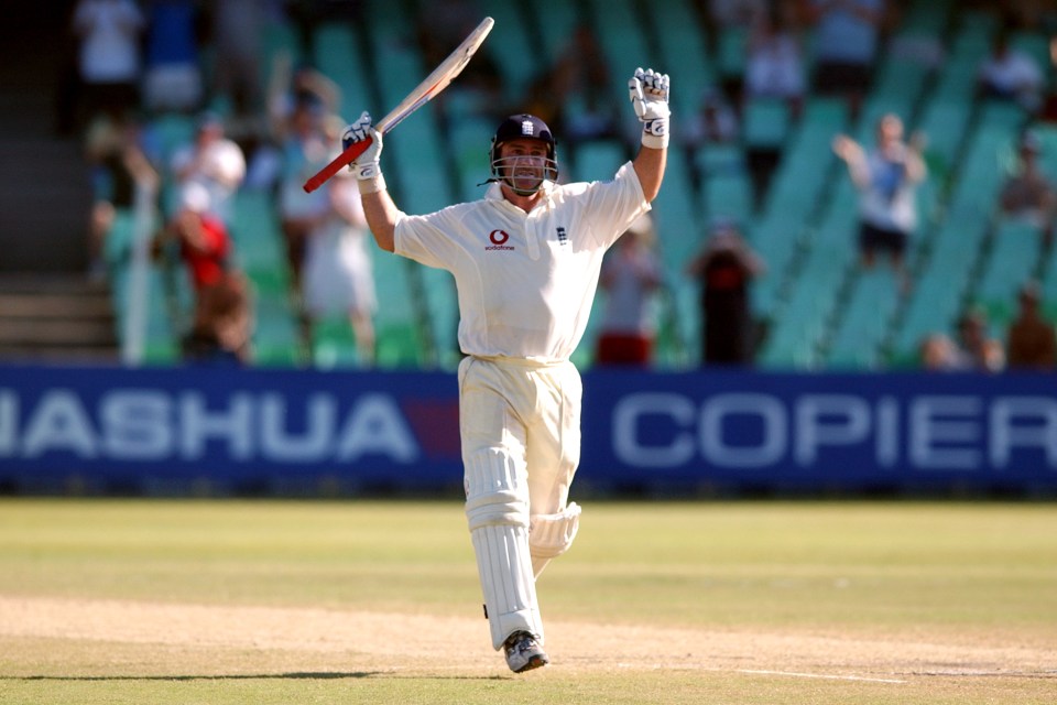 a cricket player is running on the field in front of a sign that says copier