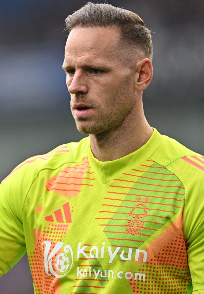 a man wearing a green shirt with kaiyun written on it