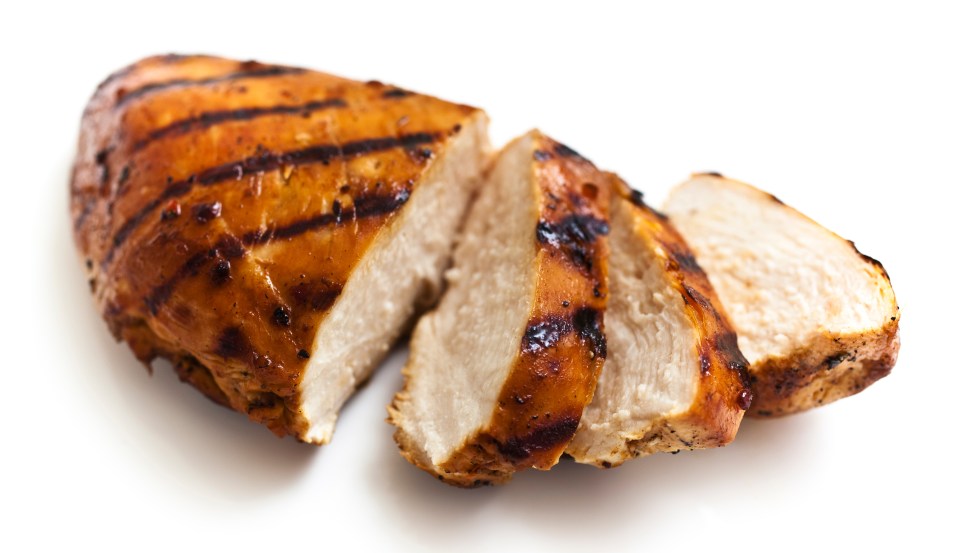 a grilled chicken breast that has been sliced in half
