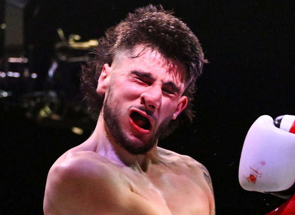 a boxer with the word simpson on his shorts
