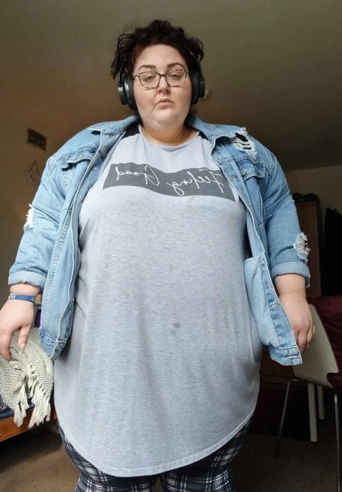 a woman wearing headphones and a shirt that says free yourself