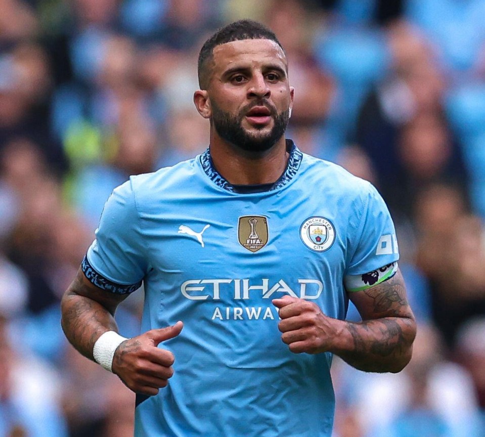 a soccer player wearing a shirt that says etihad airwa