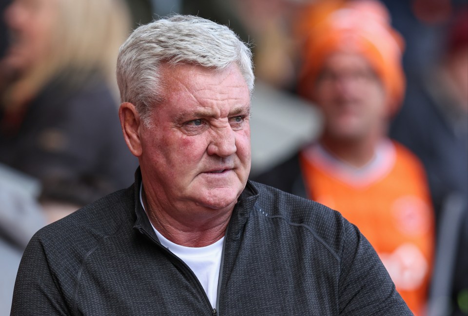 a man wearing a black jacket with the word nike on it