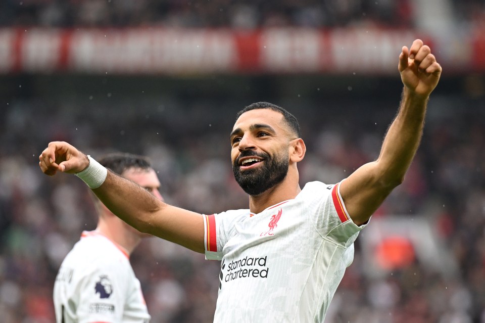 MANCHESTER, ENGLAND - SEPTEMBER 01: Mohamed Salah of Liverpool celebrates scoring his team's third goal during the Premier League match between Manchester United FC and Liverpool FC at Old Trafford on September 01, 2024 in Manchester, England. (Photo by Michael Regan/Getty Images)