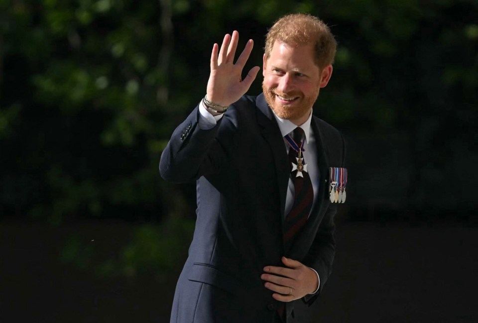 (FILES) Britain's Prince Harry, Duke of Sussex waves as he arrives to attend a ceremony marking the 10th anniversary of the Invictus Games, at St Paul's Cathedral in central London, on May 8, 2024. Prince Harry was once one of the British royal family's most popular members but as he celebrates his 40th birthday this weekend he is increasingly distanced from the UK public and his own family (Photo by JUSTIN TALLIS / AFP) (Photo by JUSTIN TALLIS/AFP via Getty Images)