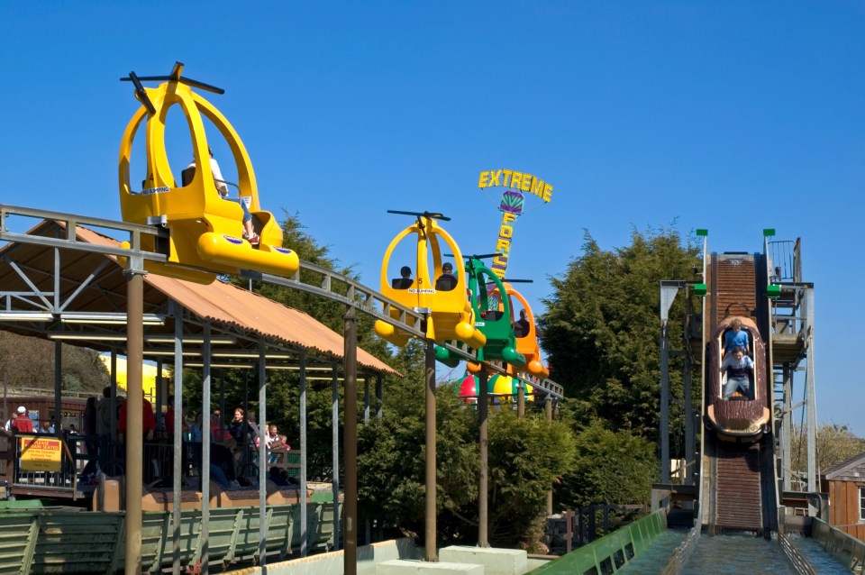 a roller coaster with a sign that says extreme