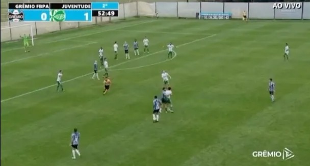 a soccer game is being played and the score is 2 to 1