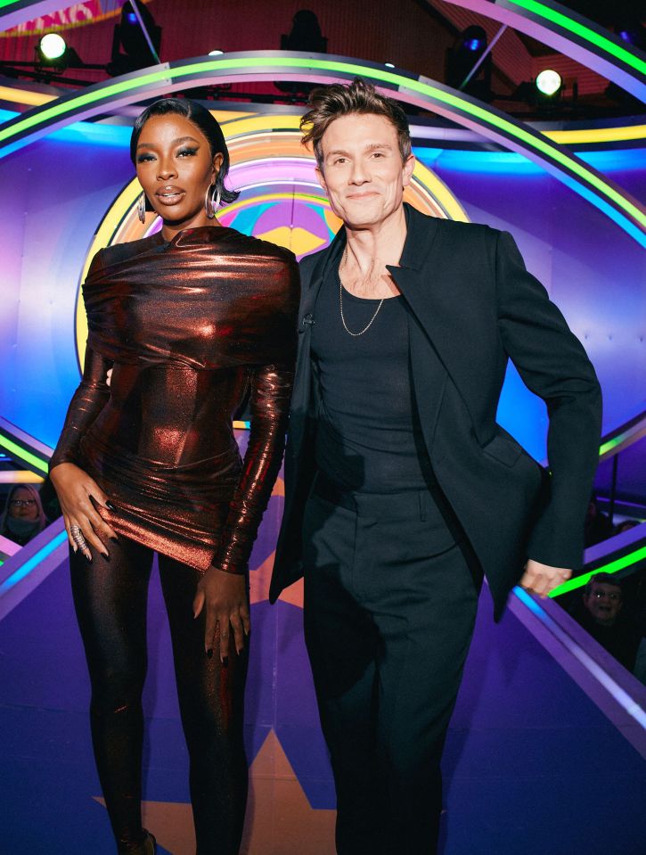 a man and a woman are posing for a picture
