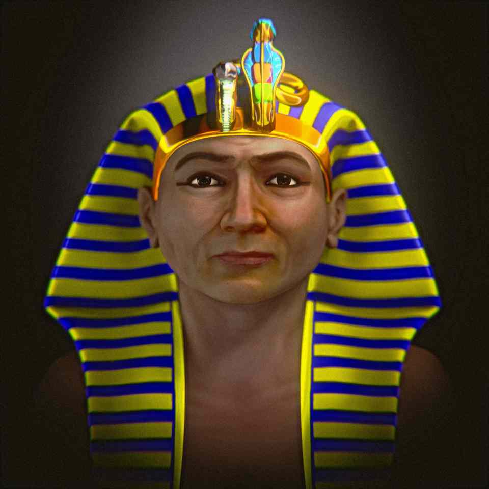 a man wearing a yellow and blue striped scarf and a gold crown