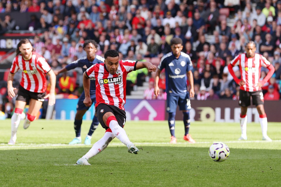 a soccer player wearing a jersey that says rollbit on it