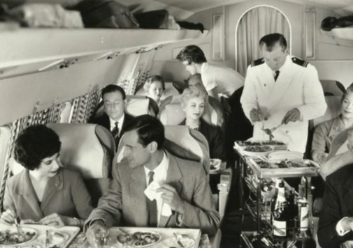 a black and white photo of people on a plane with the caption personal service in supreme jet comfort
