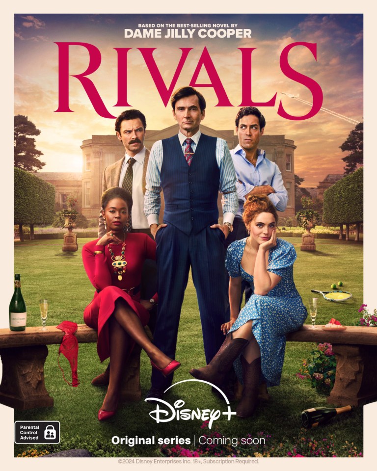 a group of people standing in front of a disney poster