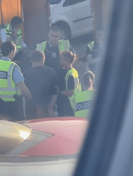 a group of people wearing yellow vests with the word polizei on them