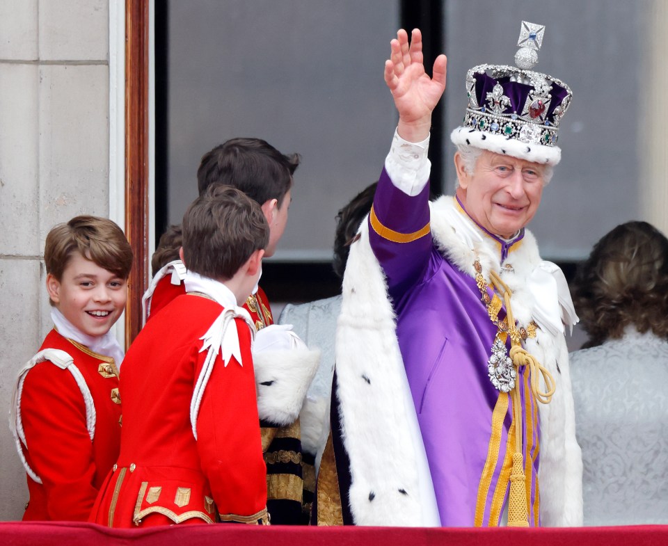 a man in a purple robe with a crown on his head