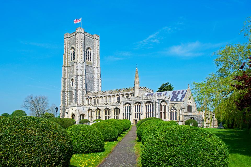 a church with a flag on top of it