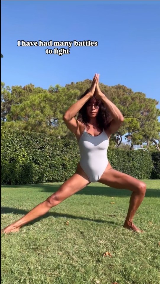 a woman in a white swimsuit is doing a yoga pose with the caption " i have had many battles to fight "