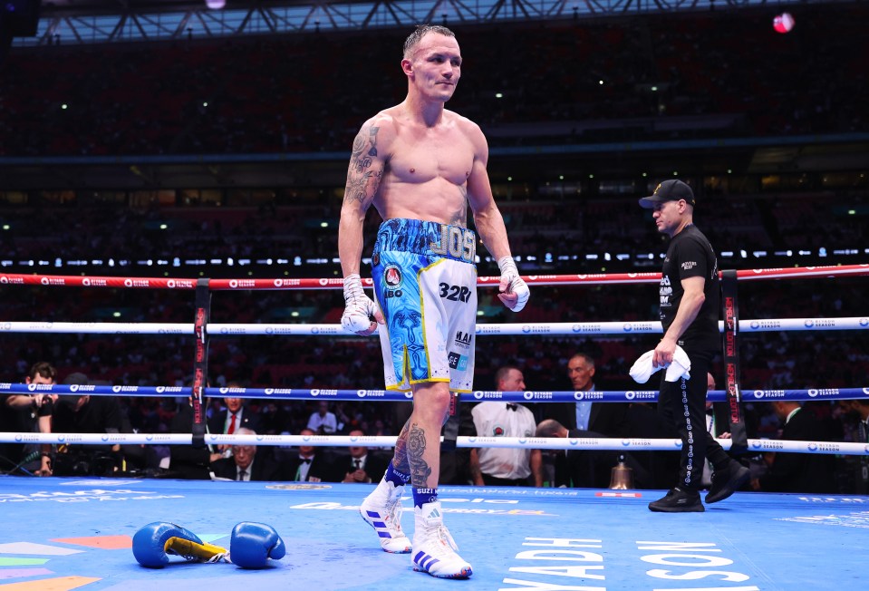 a boxer with the number 320 on his shorts