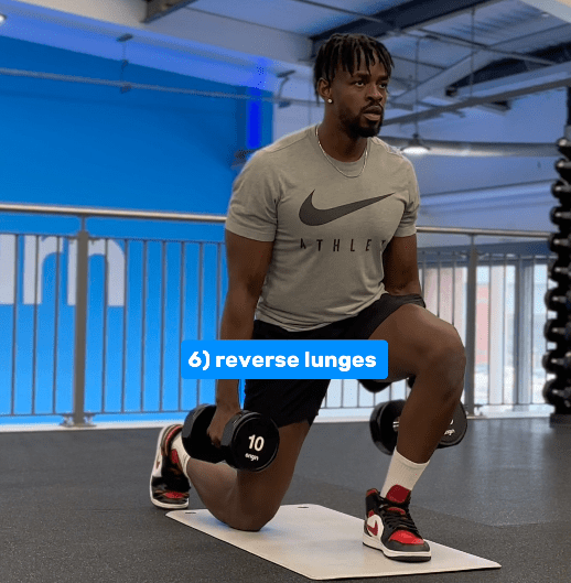 a man in a nike shirt is doing reverse lunges