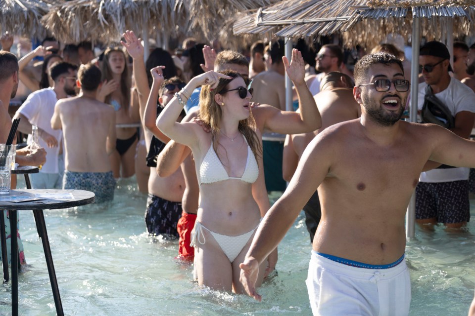 a man wearing a pair of blue calvin klein shorts