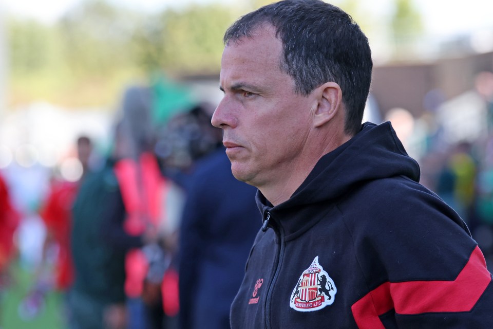 a man wearing a jacket that says ' united ' on it