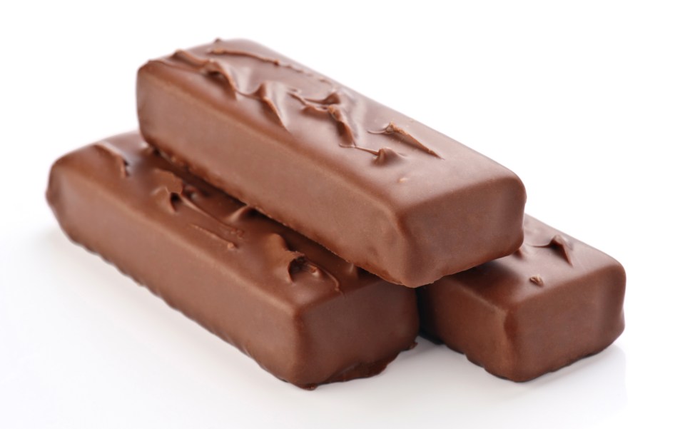 three chocolate bars are stacked on top of each other
