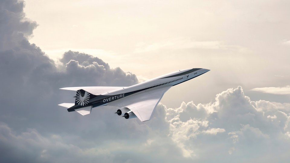 an overture airplane is flying through the clouds
