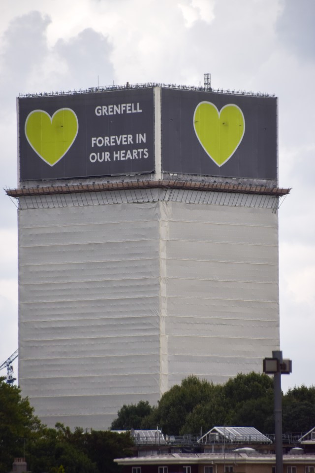 a billboard for grenfell forever in our hearts
