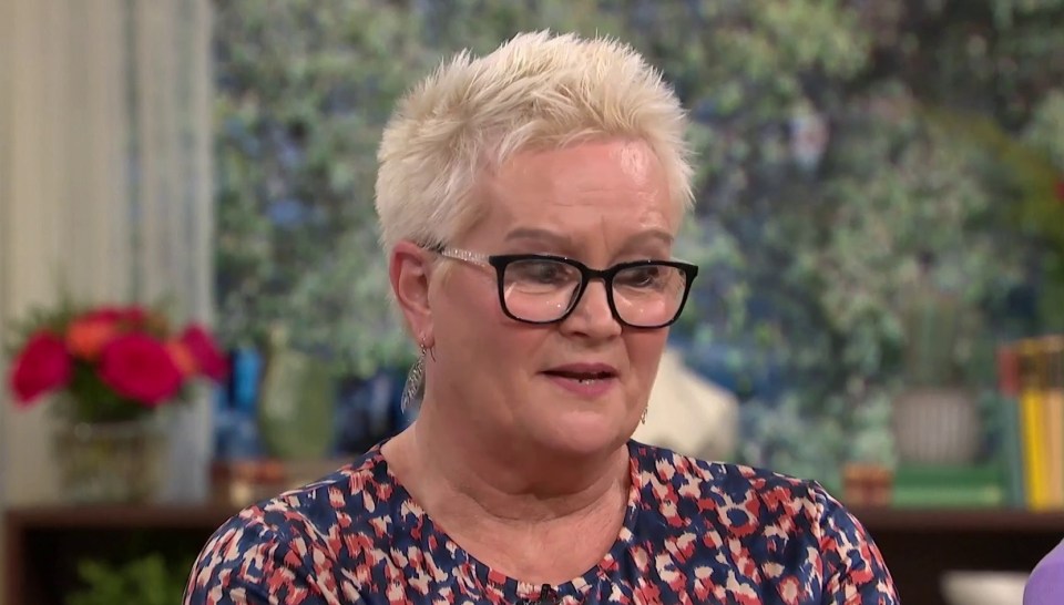 a woman with short blonde hair and glasses is on a tv show called our dream man turned out to be a conman