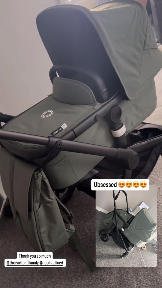 a green bugaboo stroller is sitting on a carpet