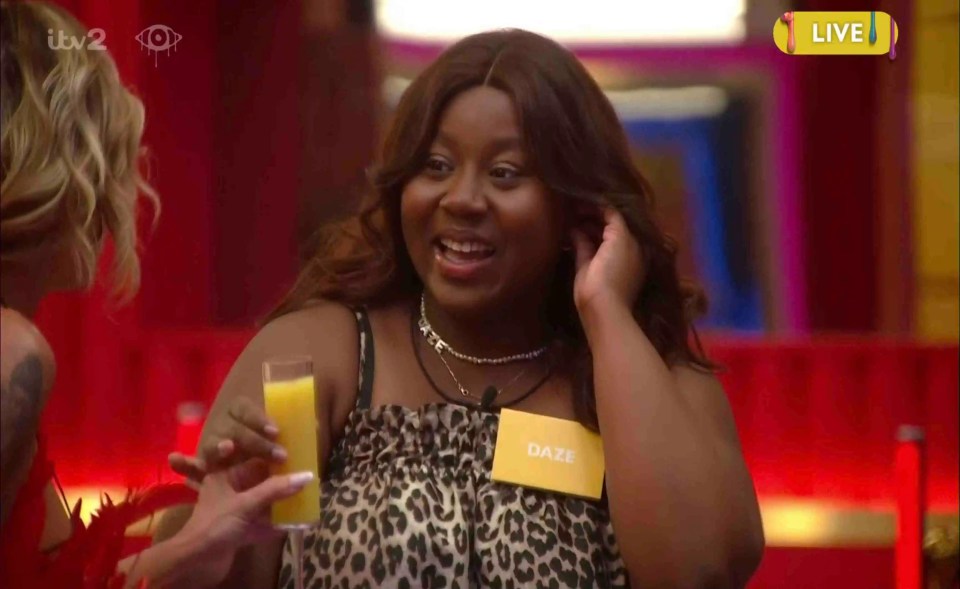 a woman with a name tag that says dazz on it