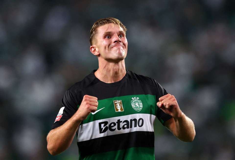 a soccer player wearing a betano jersey celebrates