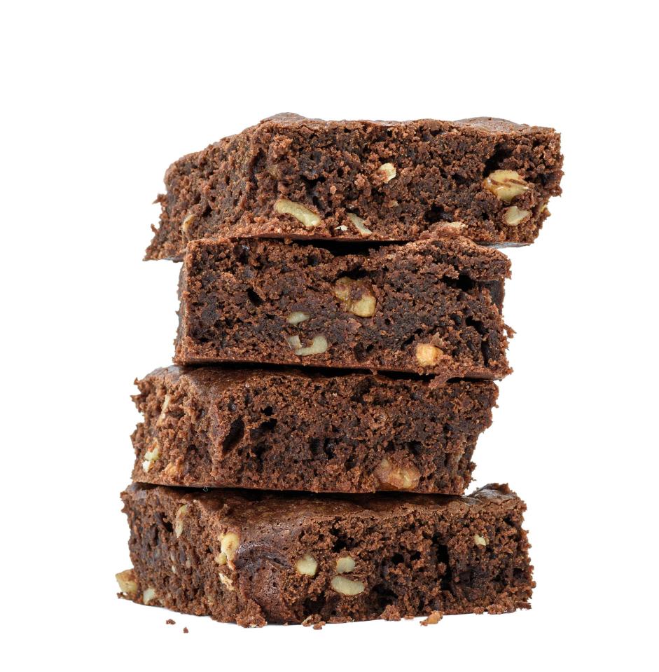 four brownies are stacked on top of each other on a white background