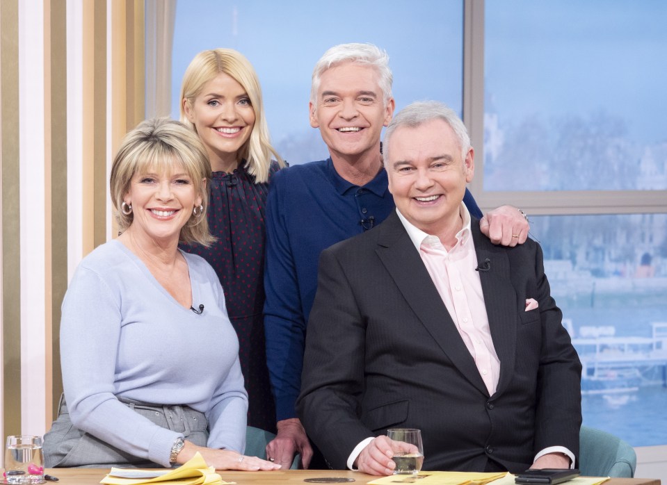a group of four people posing for a picture with the caption " this morning tv show "