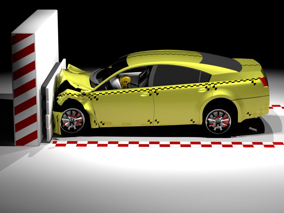 a robot is sitting in a car with an air bag