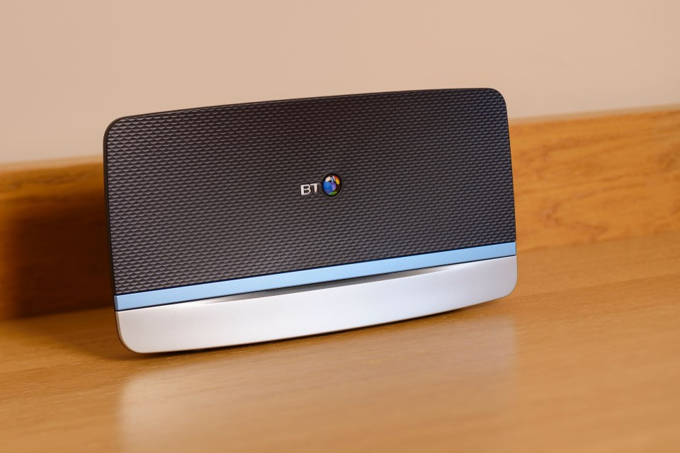 a bt device sits on a wooden table