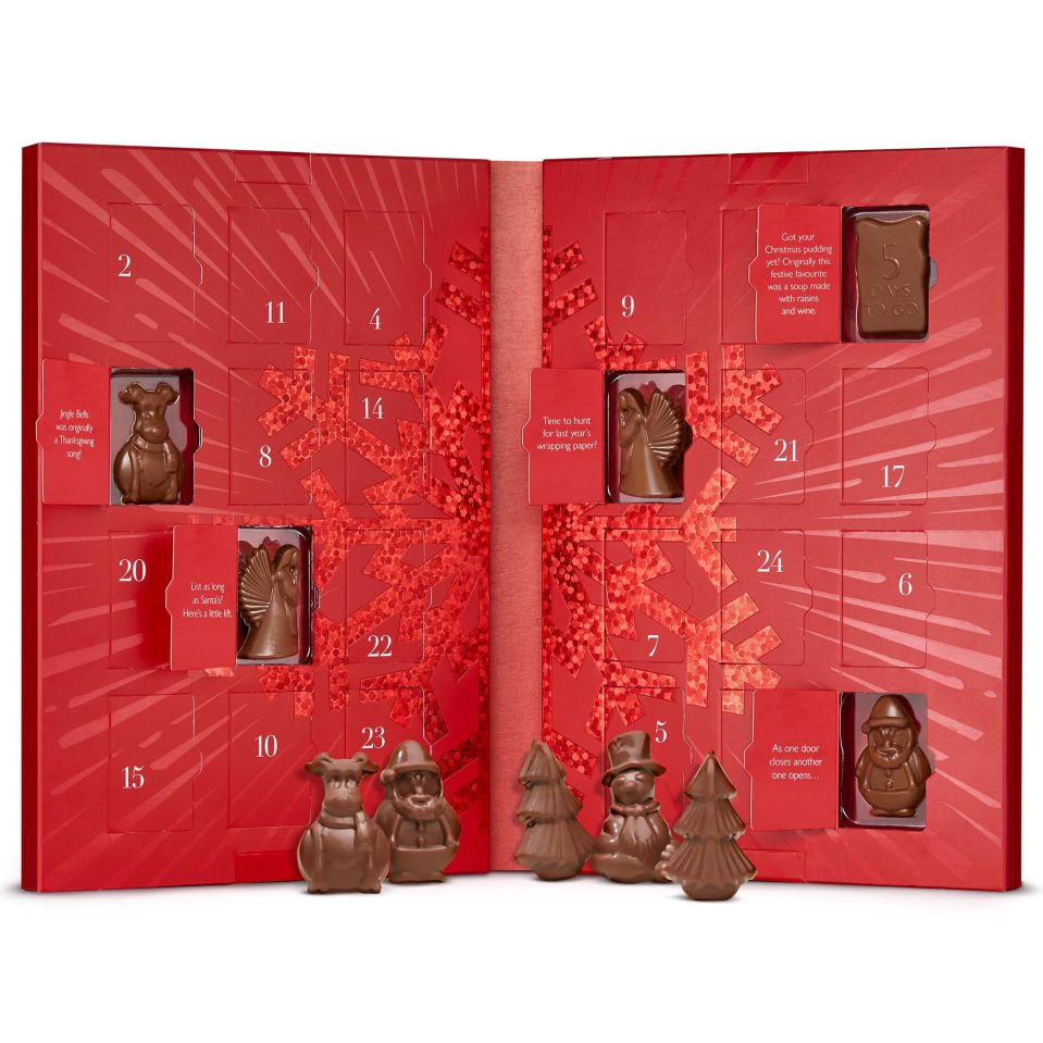 a red christmas advent calendar with chocolate figures