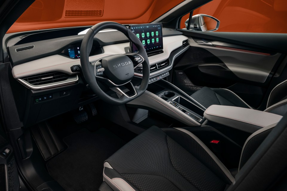 the interior of a skoda car with a steering wheel