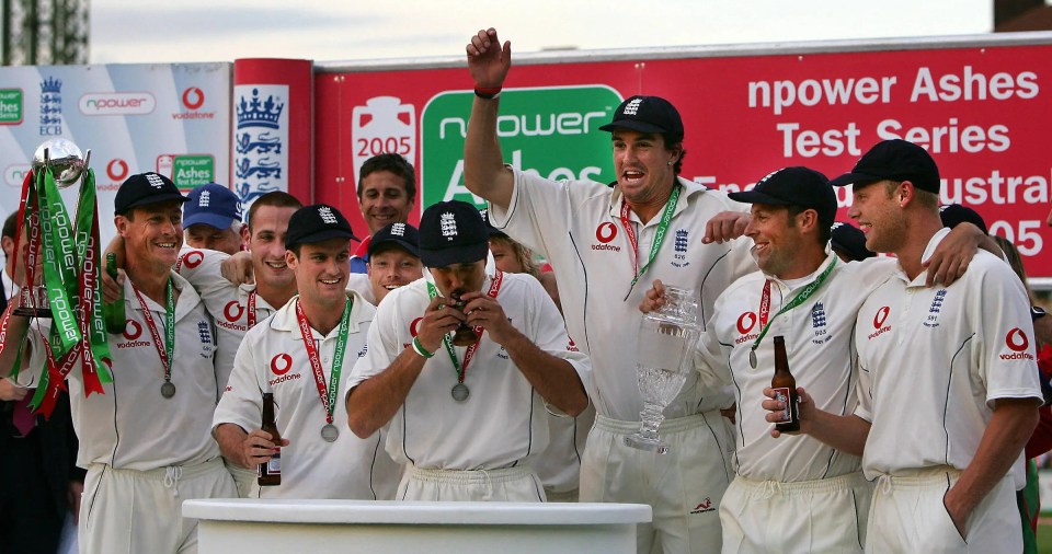 a group of cricket players are standing in front of a sign that says npower ashes test series
