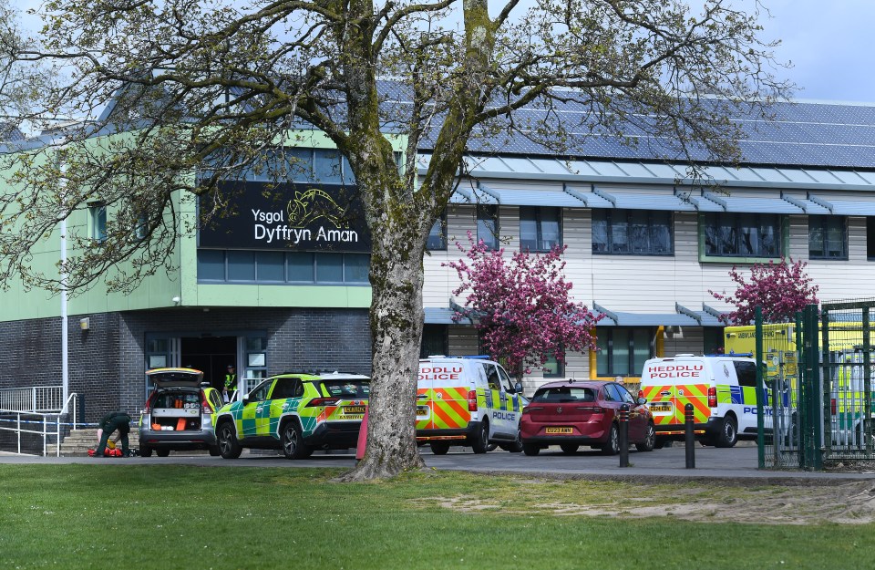 a building with a sign that says " ygol dyffryn aman "