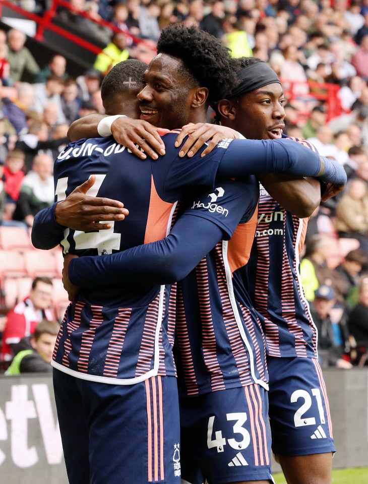 Callum Hudson-Odoi (left) Celebrates with Ola Aina (centre)
