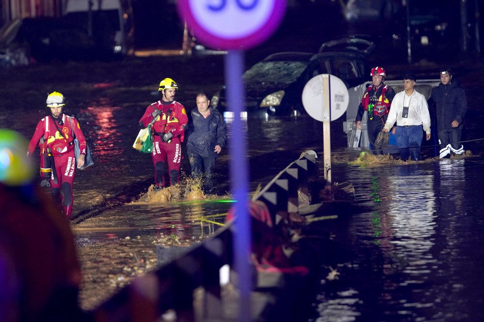 Emergency crew rescue residents after they were trapped in their homes overnight