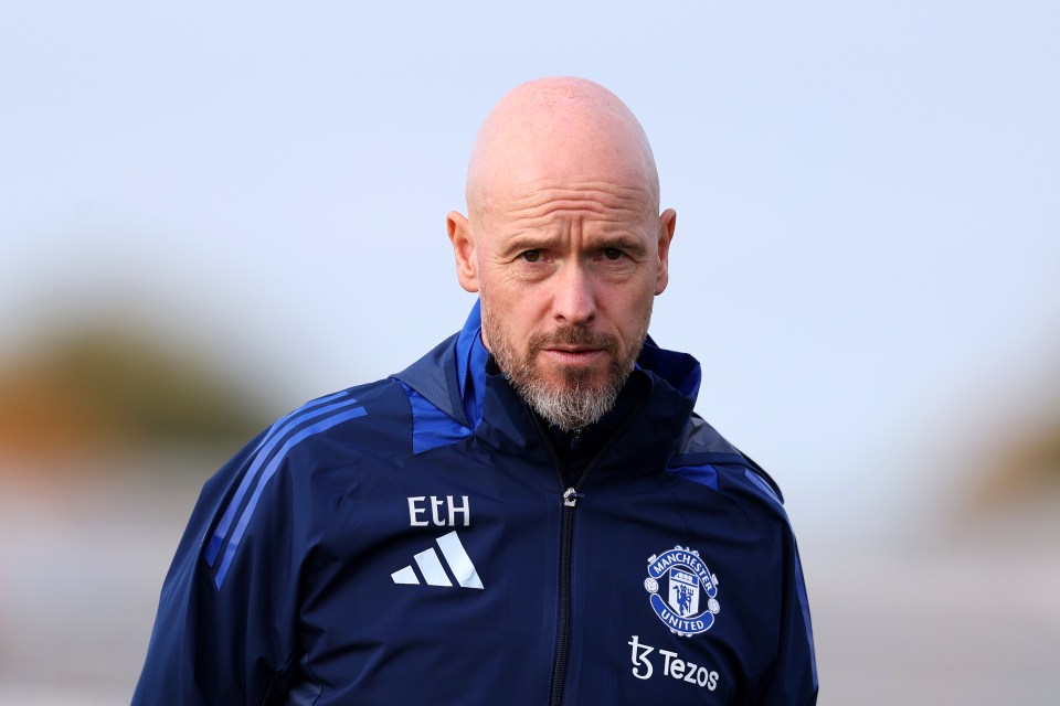 a man wearing a blue jacket with the name eth on it