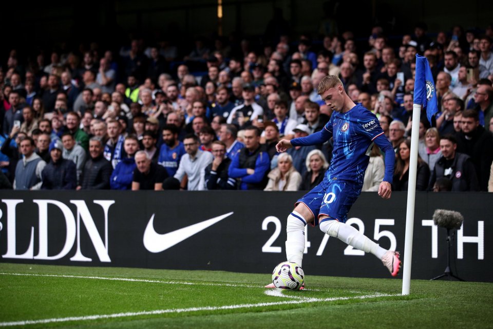 a soccer player with the number 10 on his jersey kicking a ball