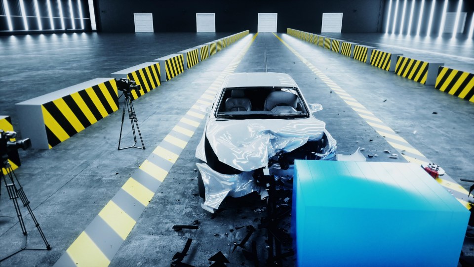 a car that has been crashed into a blue box