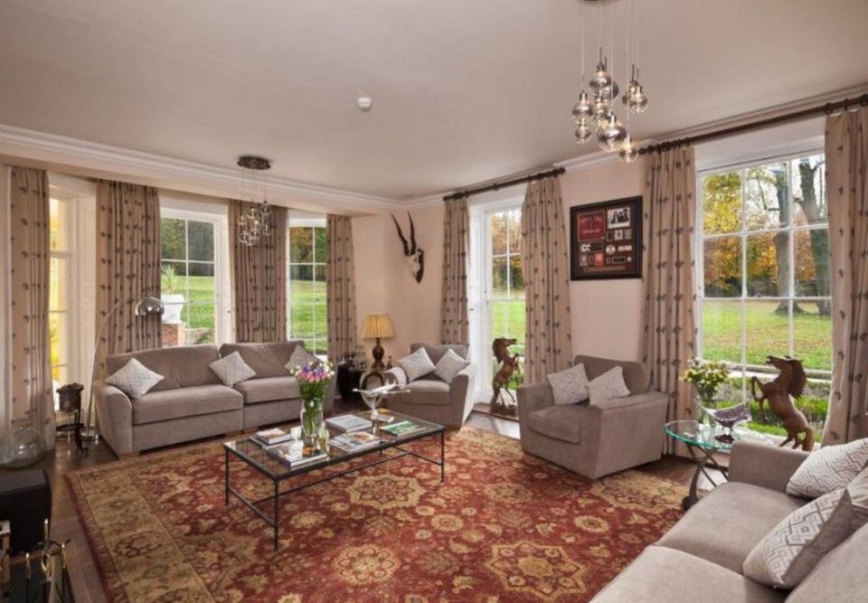 a living room with two couches and a coffee table