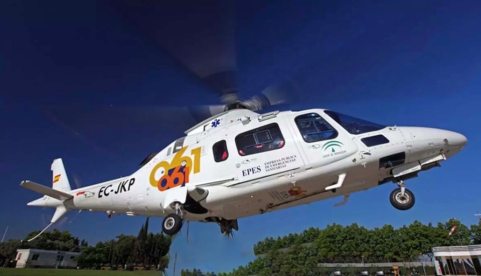a white helicopter with the letters ec-jkp on the side