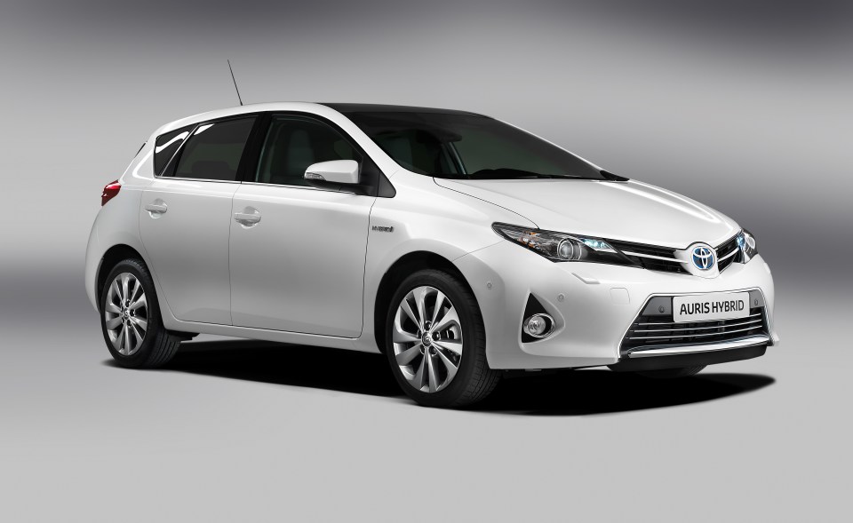 a white toyota auris hybrid is shown on a white background
