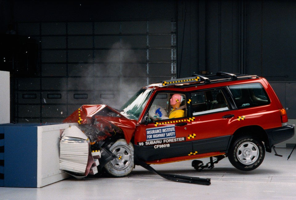 a subaru forester is being tested by the insurance institute for highway safety